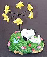 Peanuts - Snoopy Takes a Nap while Woodstock Flys About