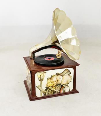 Miniature gramophone mudic box with Hummel enhancement. 