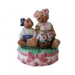 Momma and Baby Bear on Cushion Holding Flowers by Schmid