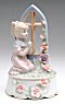 Girl Praying with Crucifix Musical Porcelain Figurine