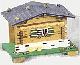 Swiss Chalet  Music Box with bench & logs